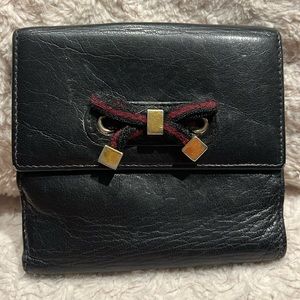 Gucci black leather bow bifold wallet